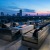 a group of couches on a rooftop overlooking a city
